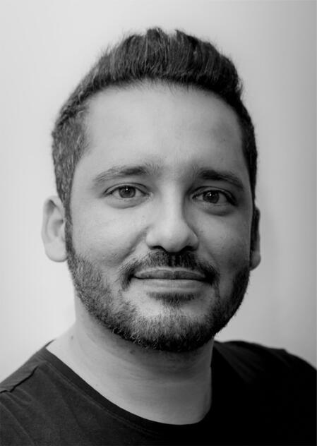 portrait picture Black and white close-up headshot of Amine Brizini